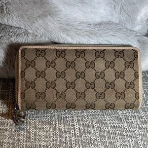 363. Gucci GG Canvas Zip Around Long Wallet